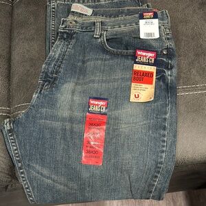 Wrangler Relaxed Blue Jeans with Faded Distressing